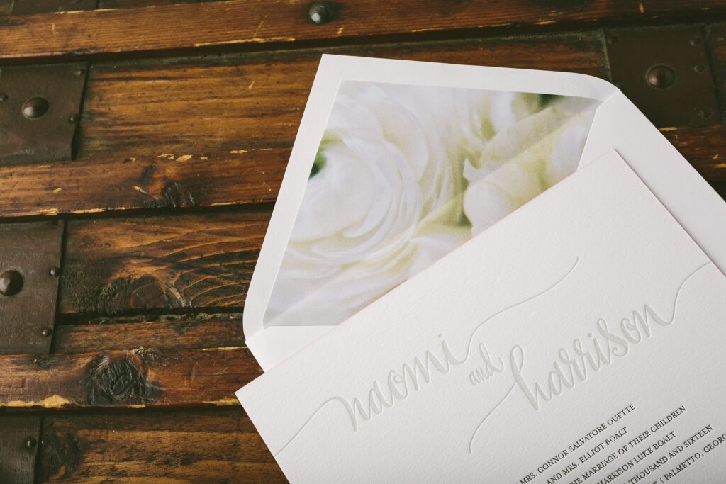 Colette letterpress + calligraphy wedding invitations from Bella Figura featuring new Flora print envelope liners