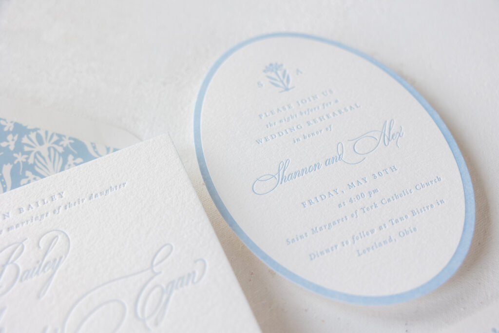 French blue letterpress rehearsal dinner invitation