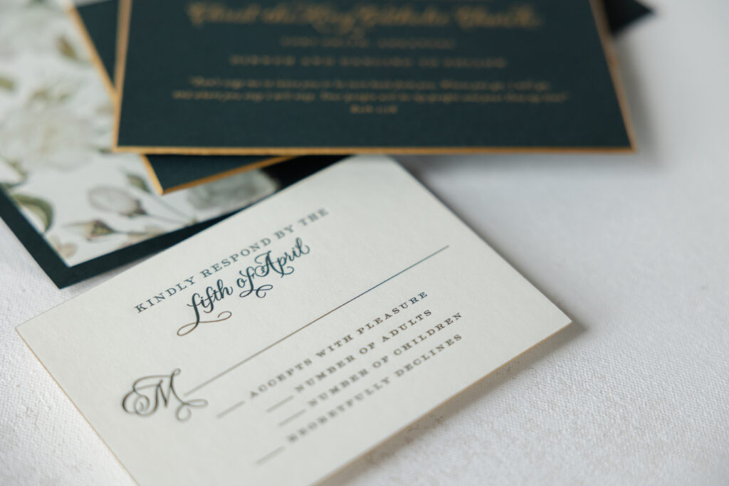 engraved reply card with hand calligraphy