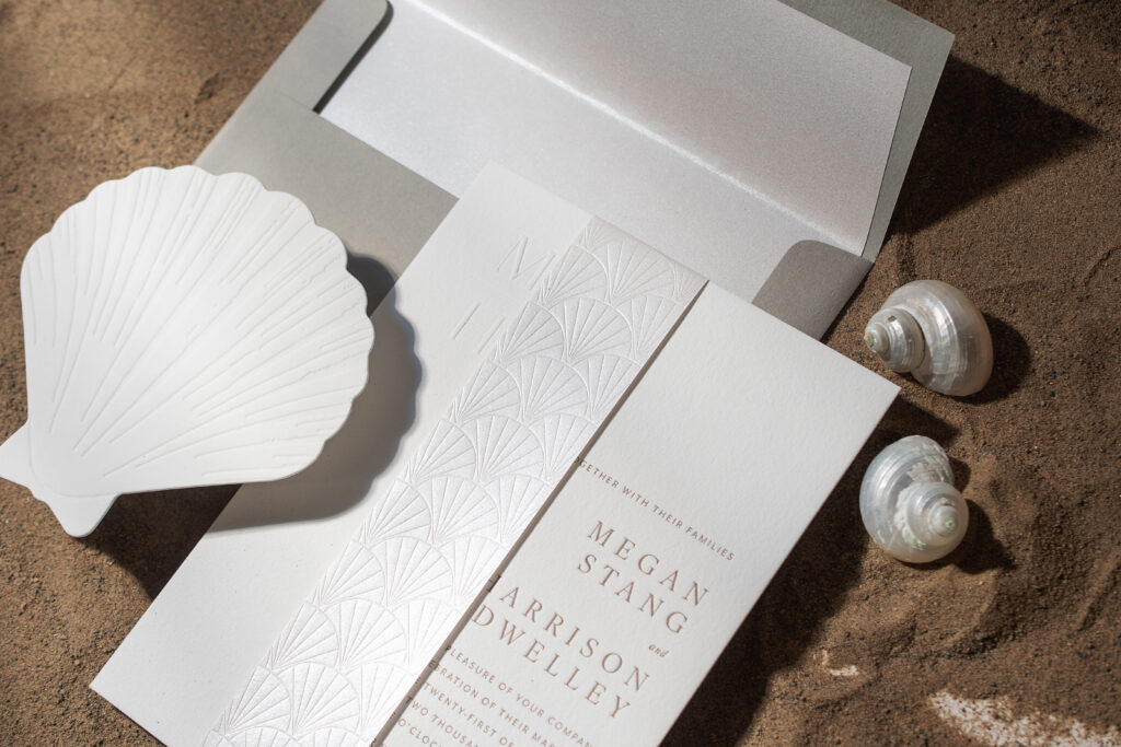 letterpress invite with foil stamped belly band