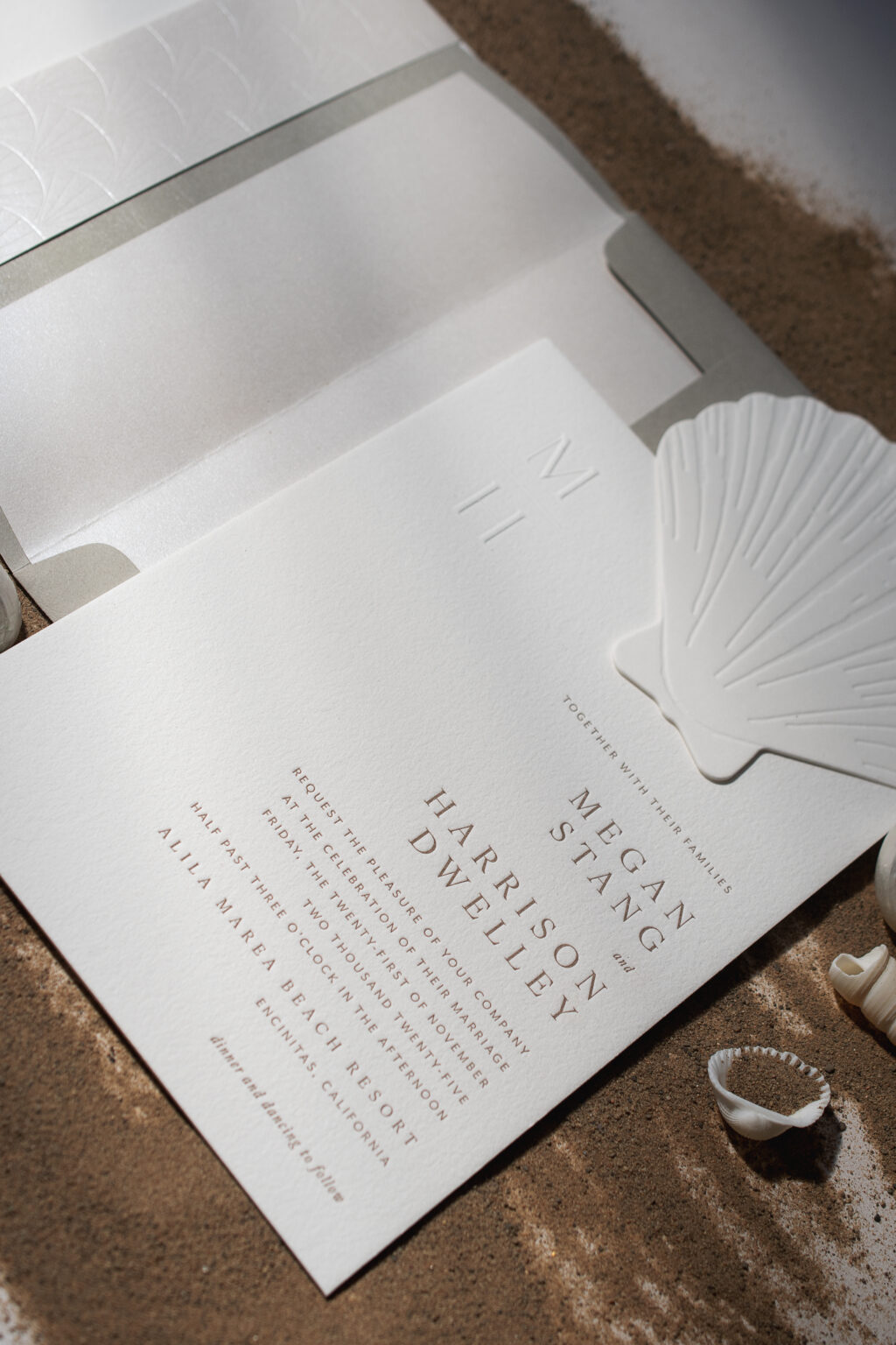 letterpress wedding invitation with embossed monogram