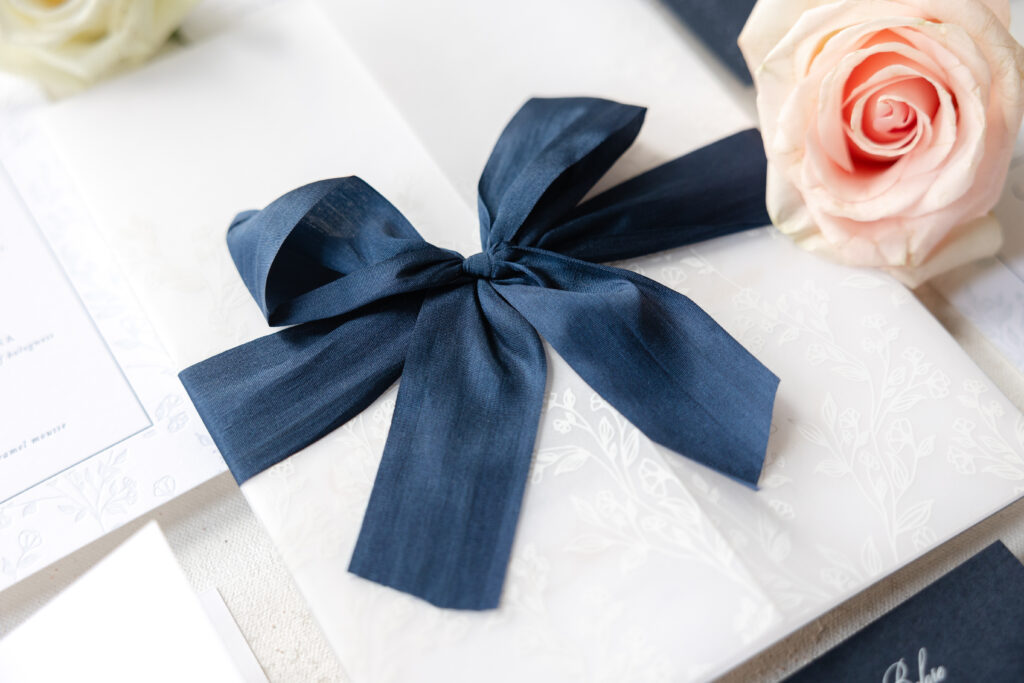 vellum gatefold with digital printing and silk ribbon