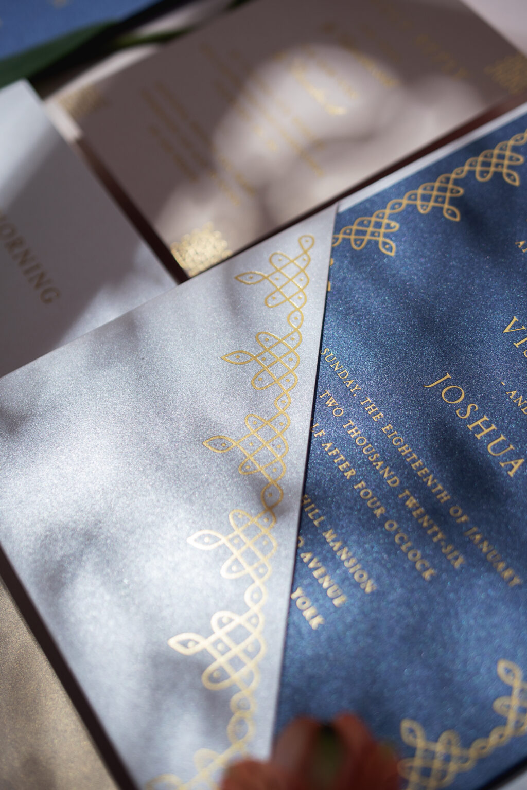 Metallic pocket panel wedding stationery