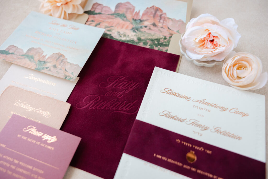 There are so many wonderful details surrounding this Southwestern wedding invitation set, from velvet to a custom illustration and more.