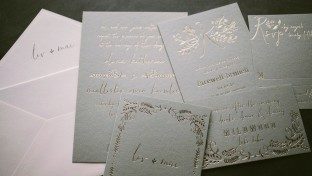 Greely foil stamped wedding invitations are printed on Smock's new gray paper