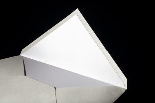 Metallic glass envelope liners from smock
