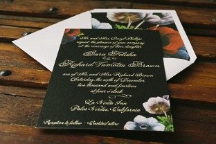 Stunning black invitations with tawny foil + bold florals from Smock