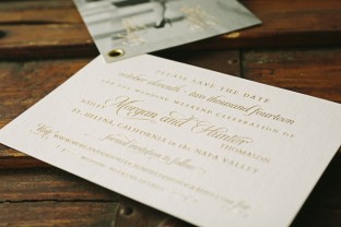 Custom grommeted foil stamped photo save the dates from Smock