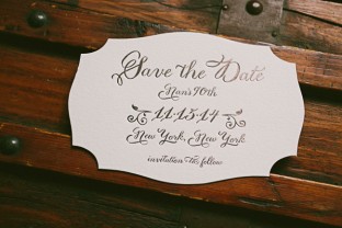 Custom Avella silver foil stamped 90th birthday party invitations from Smock