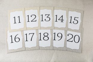 Marav gold foil stamped table cards from Smock