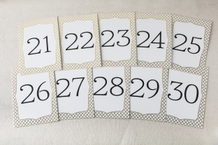 Marav gold foil stamped table cards from Smock