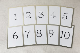Simple gold foil stamped table cards from Smock