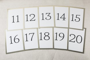 Simple gold foil stamped table cards from Smock