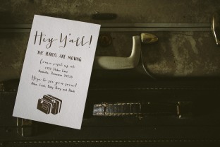 Luggage inspired letterpress moving announcements
