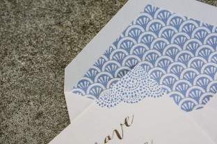 Tawny matte + cornflower letterpress save the dates from Smock