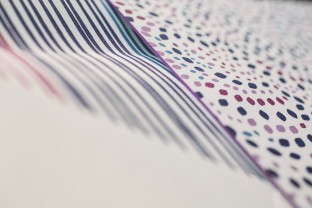 Colorful envelope liners, edge painting and patterned backing by Smock