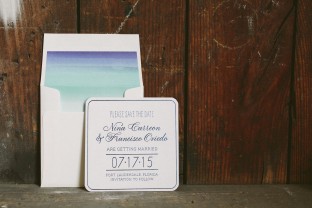 Blue foil coaster save the dates from Smock with watercolor envelope liners