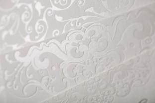 Pearl shine foil stamped wedding invitations and invitation sleeves from Smock