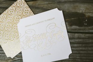 Gold foil stamped reception card from Smock with patterned backing