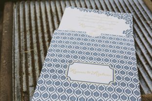 Custom gold + navy wedding invitations and sleeves from Smock