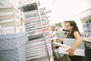 Shoppers stocking up on product at the 2016 Smock Sidewalk Sale