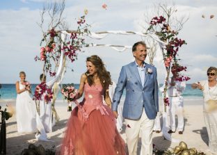 Custom pink Vera Wang wedding gown