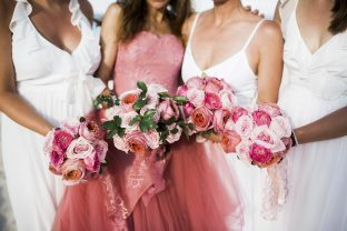 Custom pink Vera Wang wedding gown, bridesmaids in white, pink bouquets