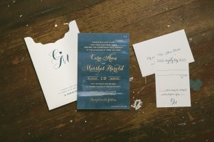 Moody navy watercolor invitations with gold foil stamped accents from Smock