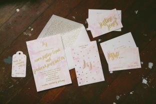 Playful watercolor wedding invitations printed in gold foil from Smock
