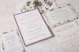 Foil stamped wedding invitations with botanical accents from Smock