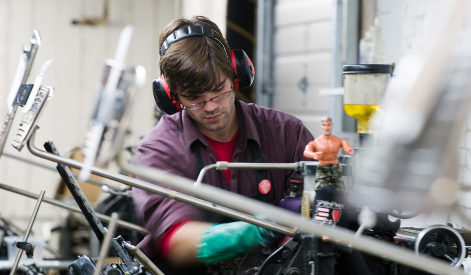 image of pressman working in the shop