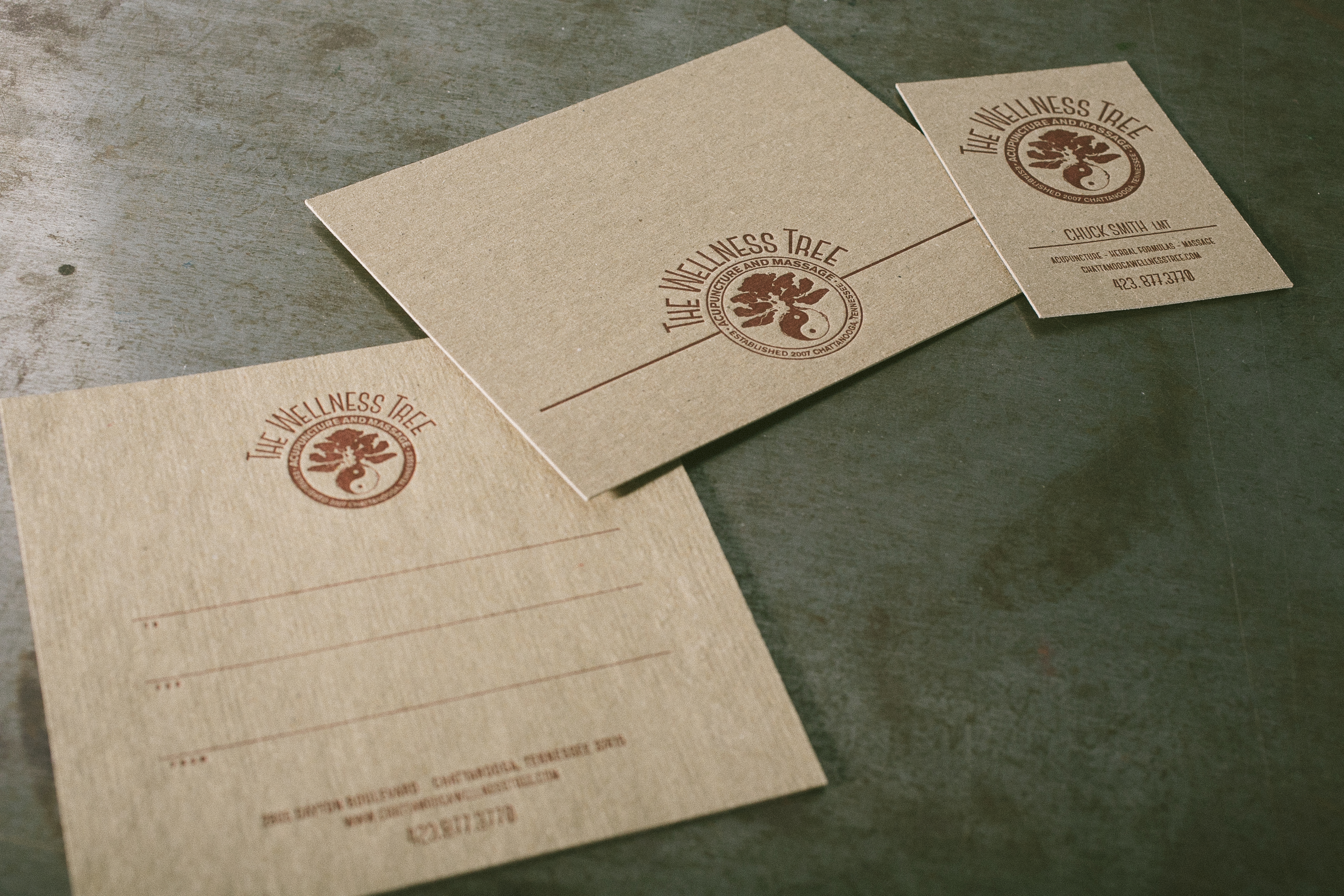 Letterpress identity suite for The Wellness Tree - printed by Boxcar Press, designed by Angelena Bruesewitz